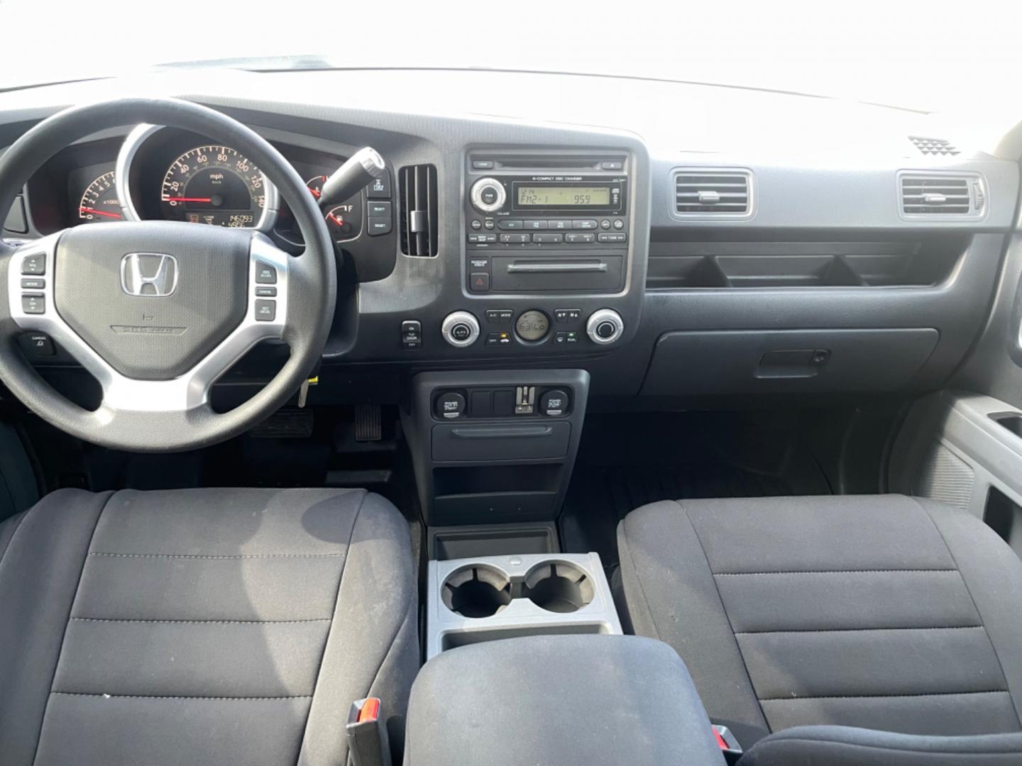 2007 SILVER HONDA RIDGELINE RTS (2HJYK16467H) with an 3.5L engine, Automatic transmission, located at 5103 Dorchester Rd., Charleston, SC, 29418-5607, (843) 767-1122, 36.245171, -115.228050 - Clean & Spacious Interior with 6-Disc CD/AUX/Sat, Dual Climate Control, Power Everything (windows, locks, seats, mirrors), All-weather Mats, Keyless Entry, Tow Package, Alloy Wheels. Clean CarFax (no accidents reported!) Local Trade-in!! 146k miles Located at New Life Auto Sales! 2023 WINNER for Po - Photo#14